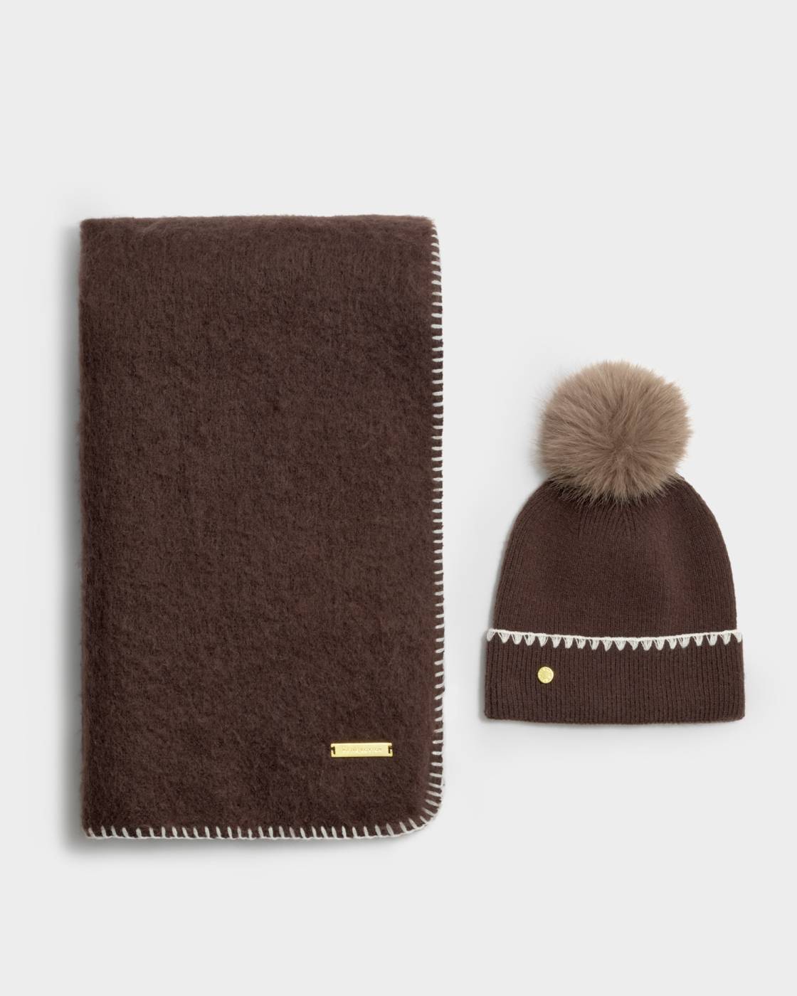 Katie Loxton - Whipstitch Pom Pom Knitted Hat