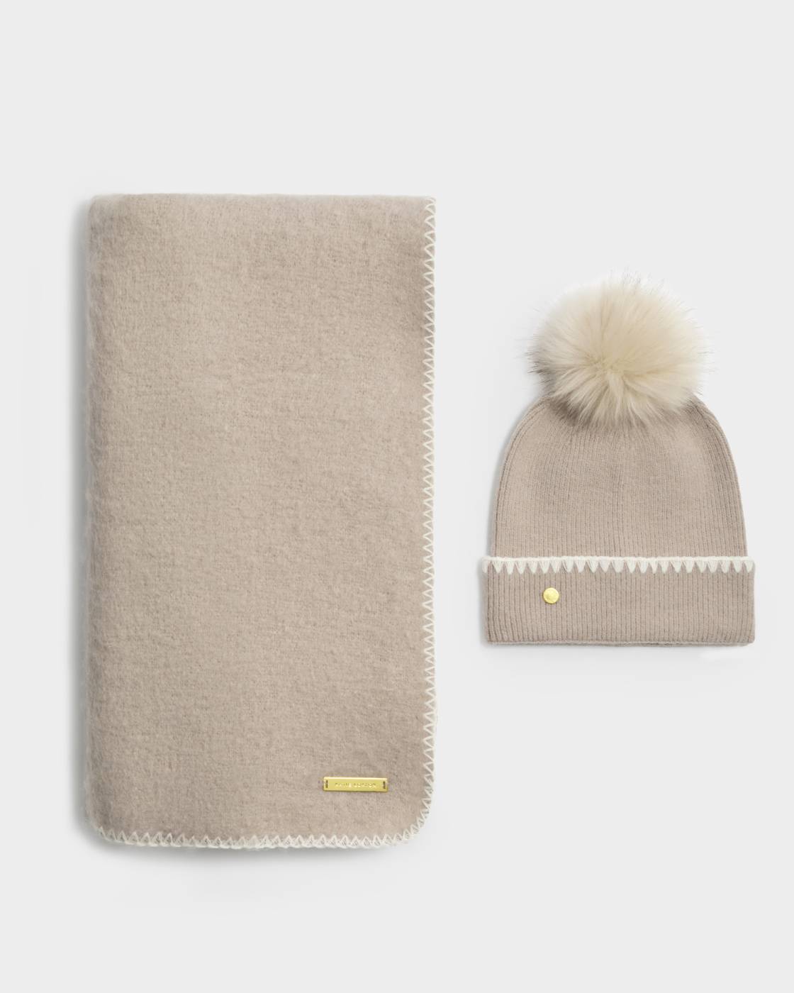 Katie Loxton - Whipstitch Pom Pom Knitted Hat